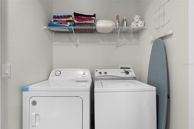 laundry area with washer and clothes dryer