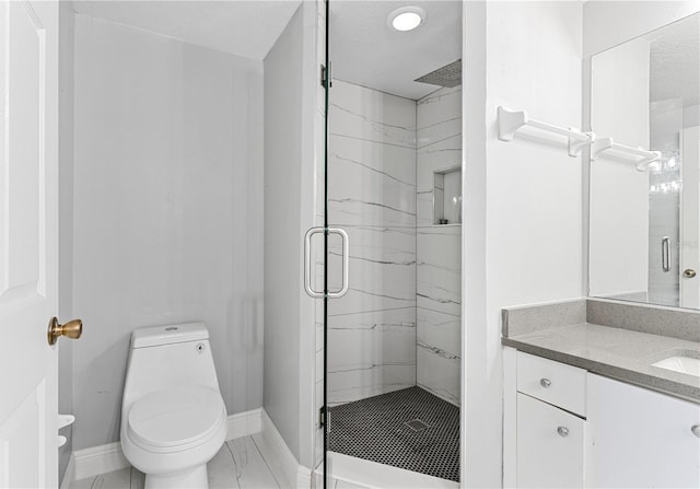 bathroom featuring a textured ceiling, vanity, toilet, and an enclosed shower