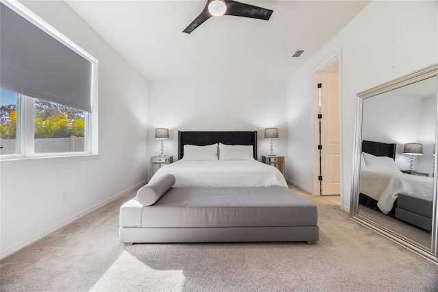 carpeted bedroom with ceiling fan