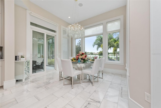 dining room with a chandelier