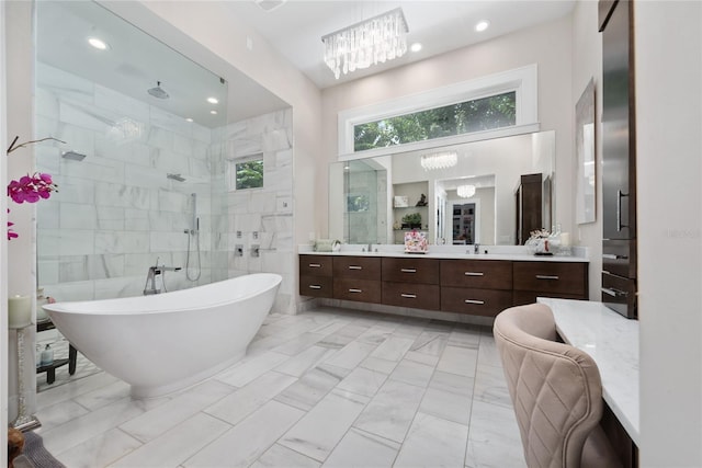 bathroom featuring tile walls, vanity, a chandelier, and shower with separate bathtub