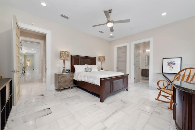 bedroom featuring ensuite bathroom and ceiling fan