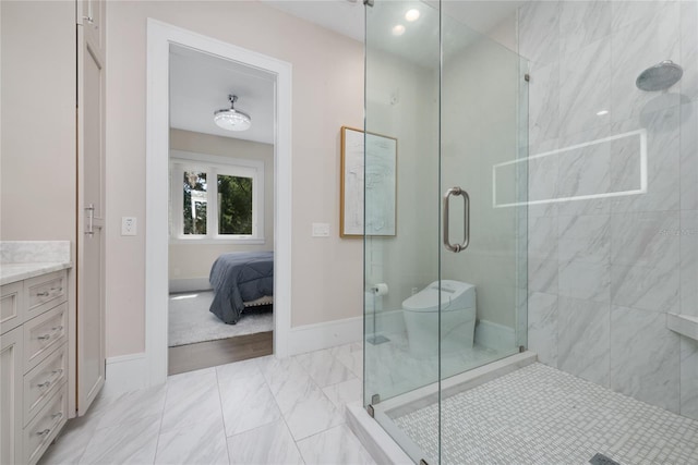 bathroom with vanity, an enclosed shower, and toilet