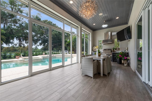 sunroom with wood ceiling