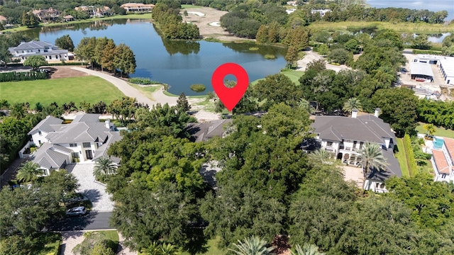 birds eye view of property featuring a water view