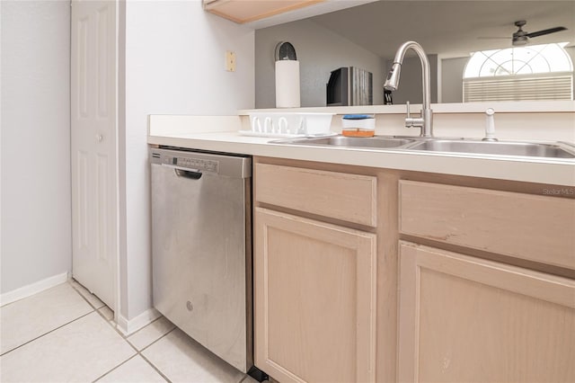 kitchen with dishwasher, light tile patterned flooring, sink, light brown cabinets, and ceiling fan