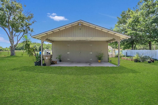 exterior space featuring a lawn and a patio area