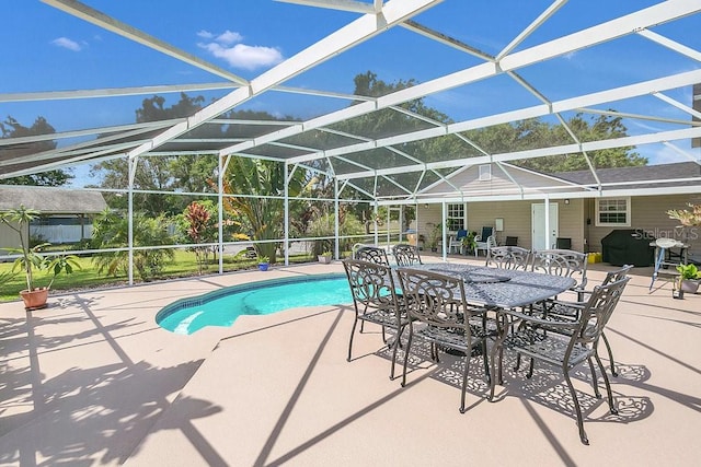 view of pool featuring a lanai and a patio area