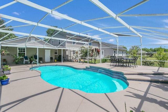 view of swimming pool featuring a lanai, a patio, and pool water feature