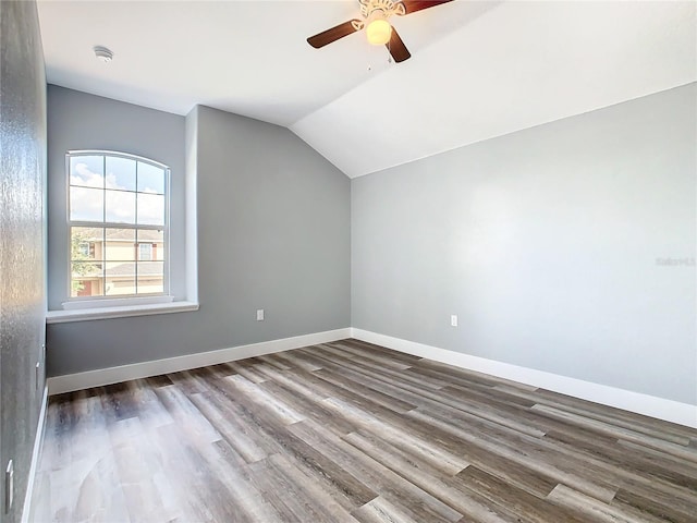 bonus room featuring ceiling fan, wood-type flooring, and vaulted ceiling