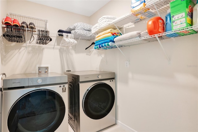 laundry room with washer and dryer