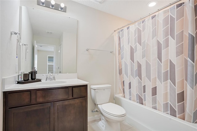 full bathroom featuring shower / bath combination with curtain, vanity, tile patterned floors, and toilet