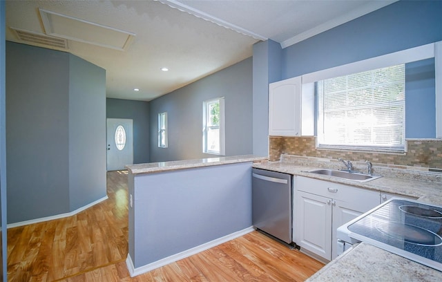 1501 NE 57th St, Ocala, FL 34479 - kitchen with a sink, stainless steel dishwasher, visible vents, and white cabinets