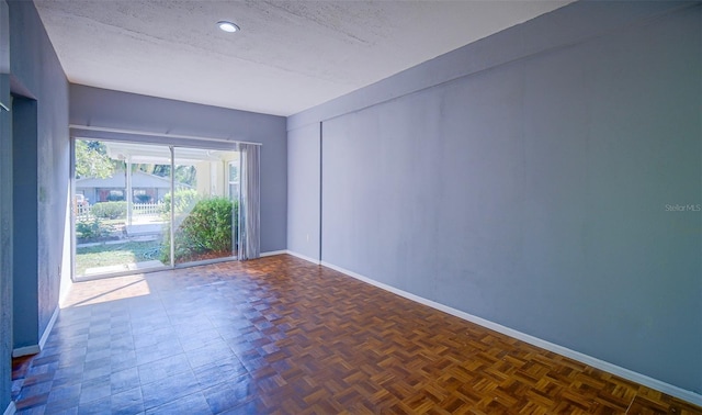 1501 NE 57th St, Ocala, FL 34479 - empty room with a textured ceiling and baseboards