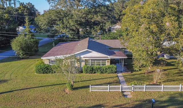 1501 NE 57th St, Ocala, FL 34479 - view of front of property with a front lawn and fence
