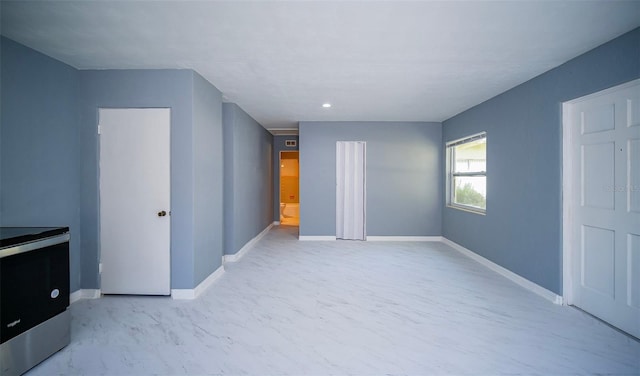 1501 NE 57th St, Ocala, FL 34479 - unfurnished bedroom featuring baseboards