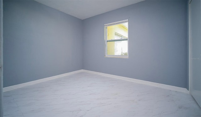 1501 NE 57th St, Ocala, FL 34479 - empty room featuring baseboards