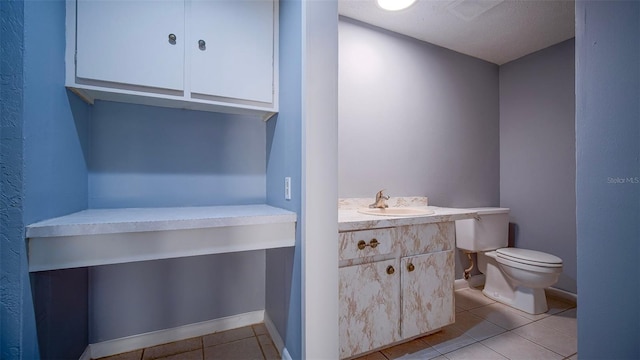 1501 NE 57th St, Ocala, FL 34479 - bathroom featuring toilet, tile patterned floors, and vanity