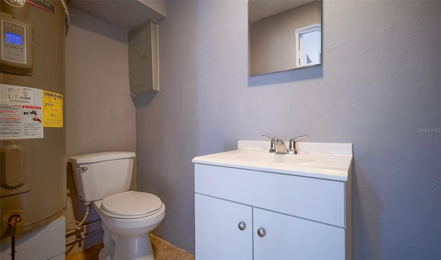 1501 NE 57th St, Ocala, FL 34479 - bathroom featuring toilet, vanity, water heater, and electric panel