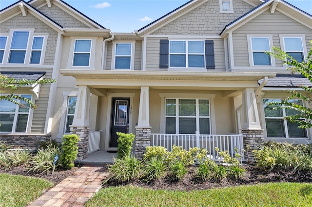 craftsman-style house featuring covered porch