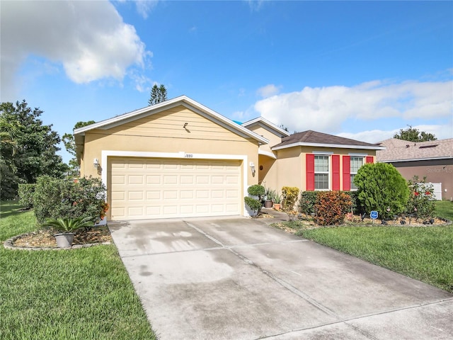 ranch-style home with a garage and a front yard