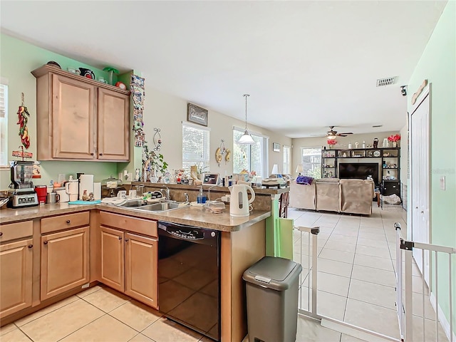 kitchen with ceiling fan, sink, black dishwasher, kitchen peninsula, and light tile patterned floors