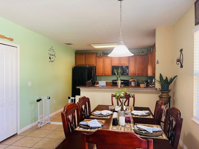 view of tiled dining room