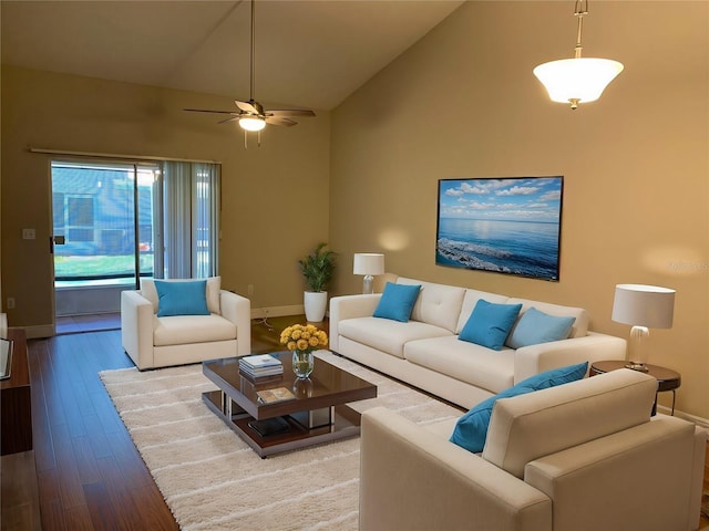 living room with ceiling fan, high vaulted ceiling, and hardwood / wood-style floors