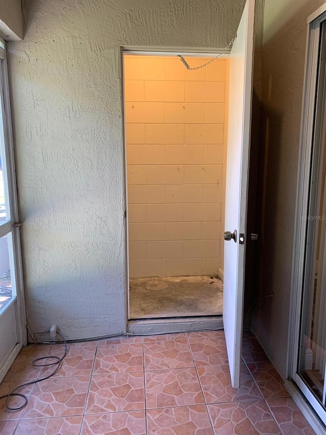 bathroom featuring a shower