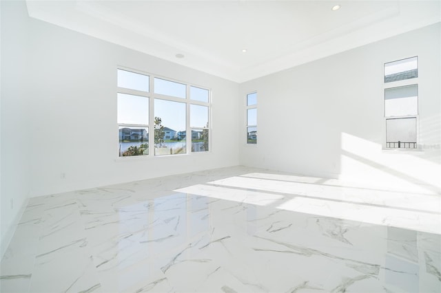 unfurnished room with ornamental molding