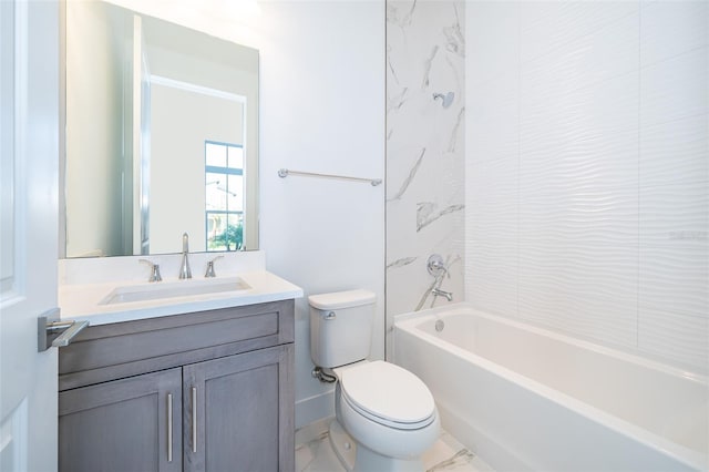 full bathroom with tiled shower / bath, vanity, and toilet