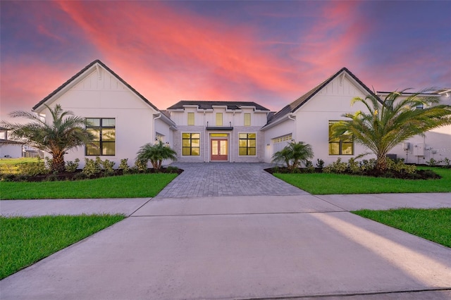 view of front of home featuring a yard