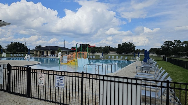 view of swimming pool with a patio area