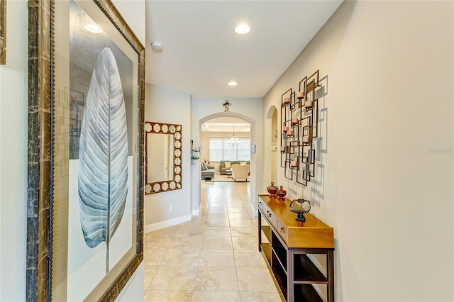 hallway featuring light tile patterned floors