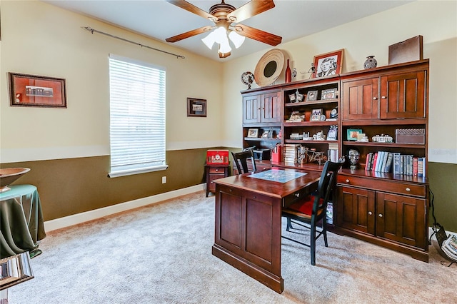 office area with light carpet and ceiling fan