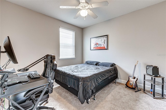 bedroom featuring light carpet and ceiling fan