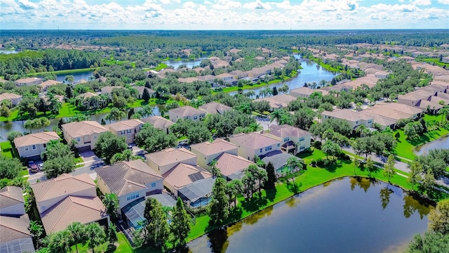 drone / aerial view with a water view