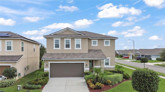 front facade with a garage