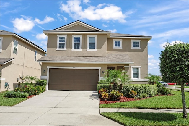 view of property with a garage