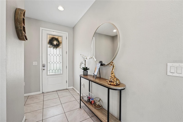 entrance foyer with light tile patterned floors