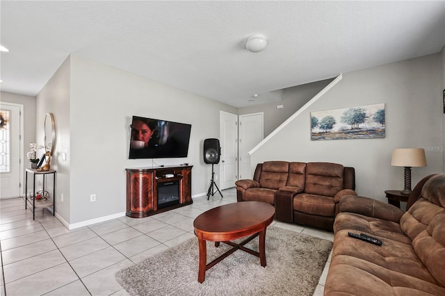 living room featuring light tile patterned flooring