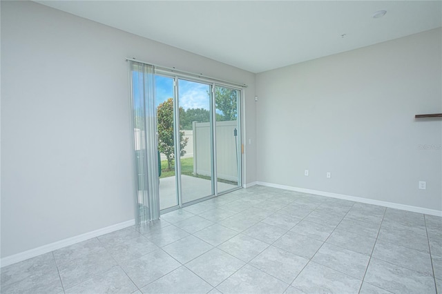 view of tiled spare room