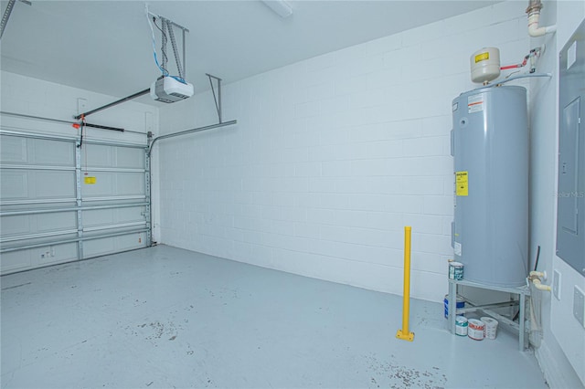 garage featuring gas water heater and a garage door opener