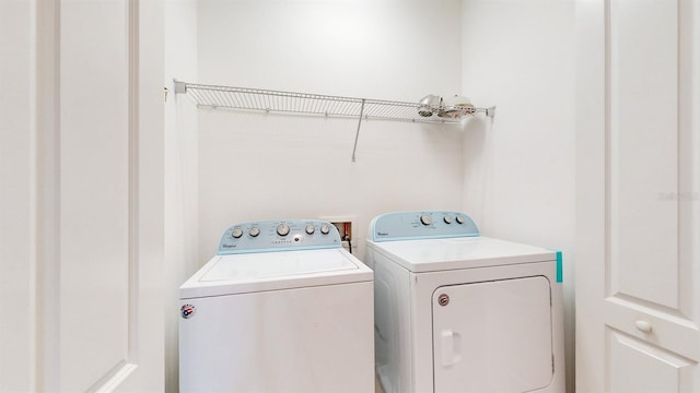 laundry area with washer and dryer