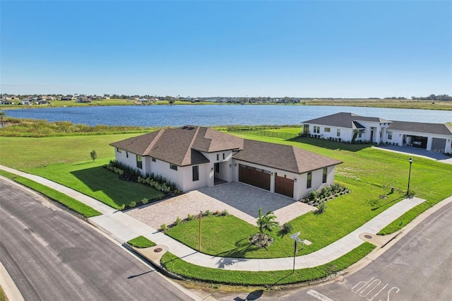 drone / aerial view featuring a water view