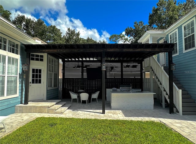 view of patio featuring a pergola and area for grilling