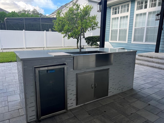 view of patio featuring exterior kitchen