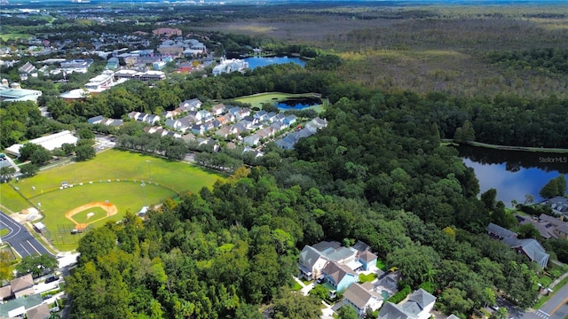 drone / aerial view with a water view