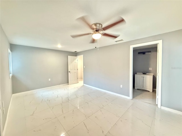 unfurnished room featuring ceiling fan