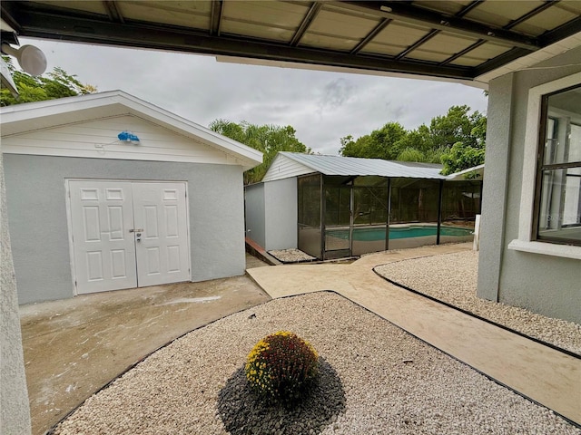 exterior space with a storage shed